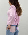 Jeans con tasca brillantinata