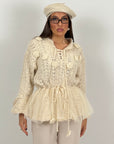 Maglia simil lana con fiori in 3D