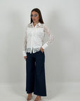Jeans palazzo con riga tratteggiata