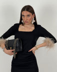 SALDO Abito lungo con piume