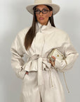 Cordset SARIKA - Completo giacca con cintura e pantalone in ecopelle