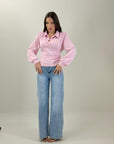 Jeans con tasca brillantinata