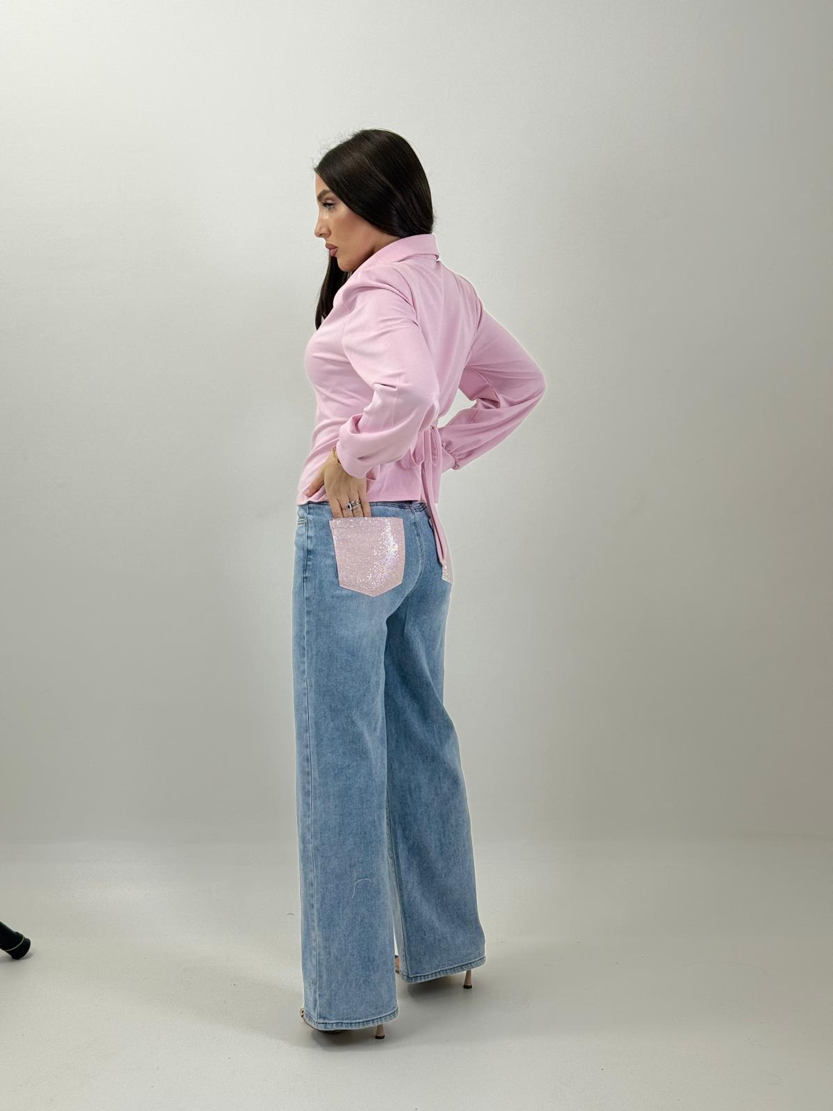 Jeans con tasca brillantinata