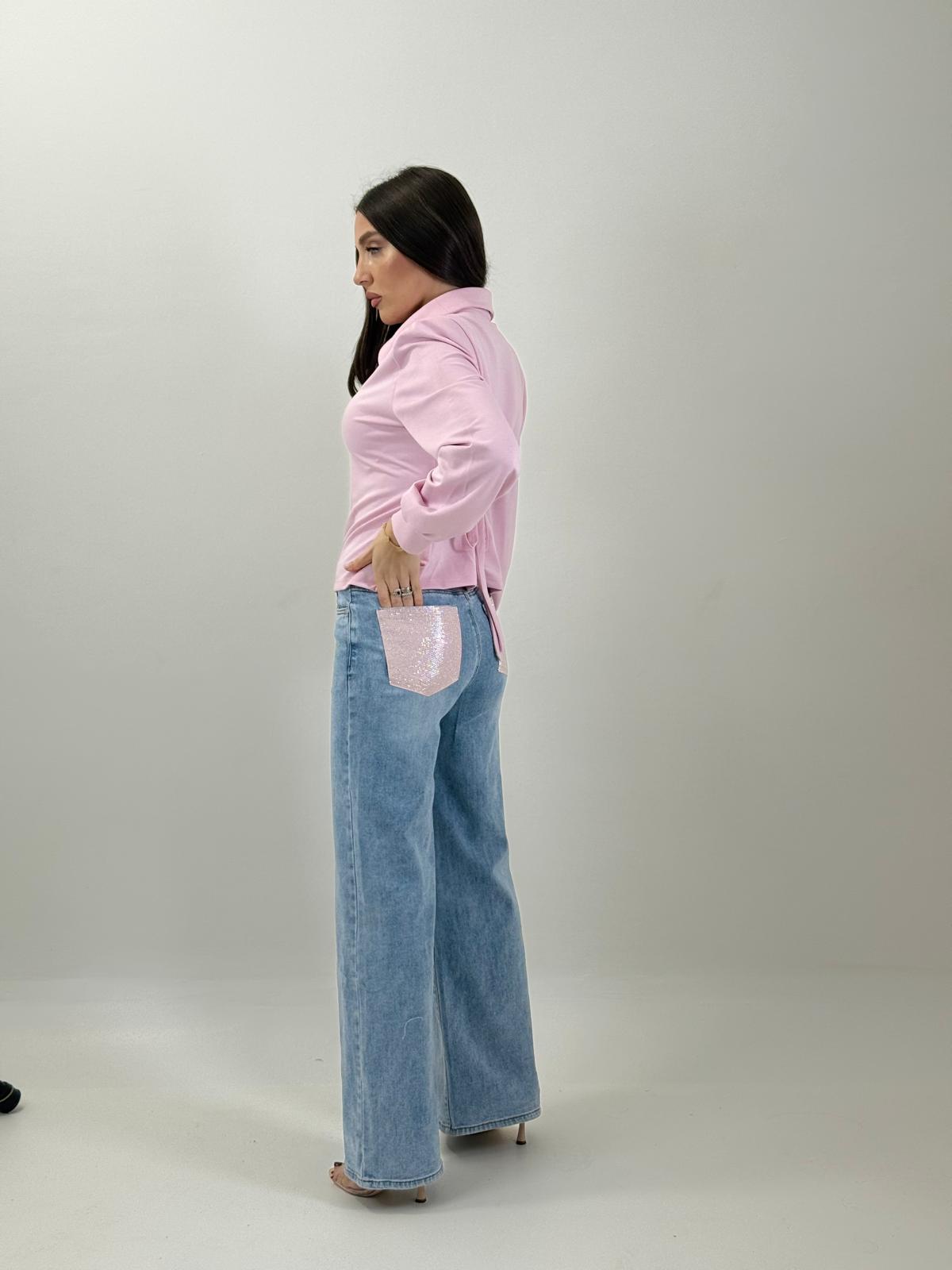Jeans con tasca brillantinata