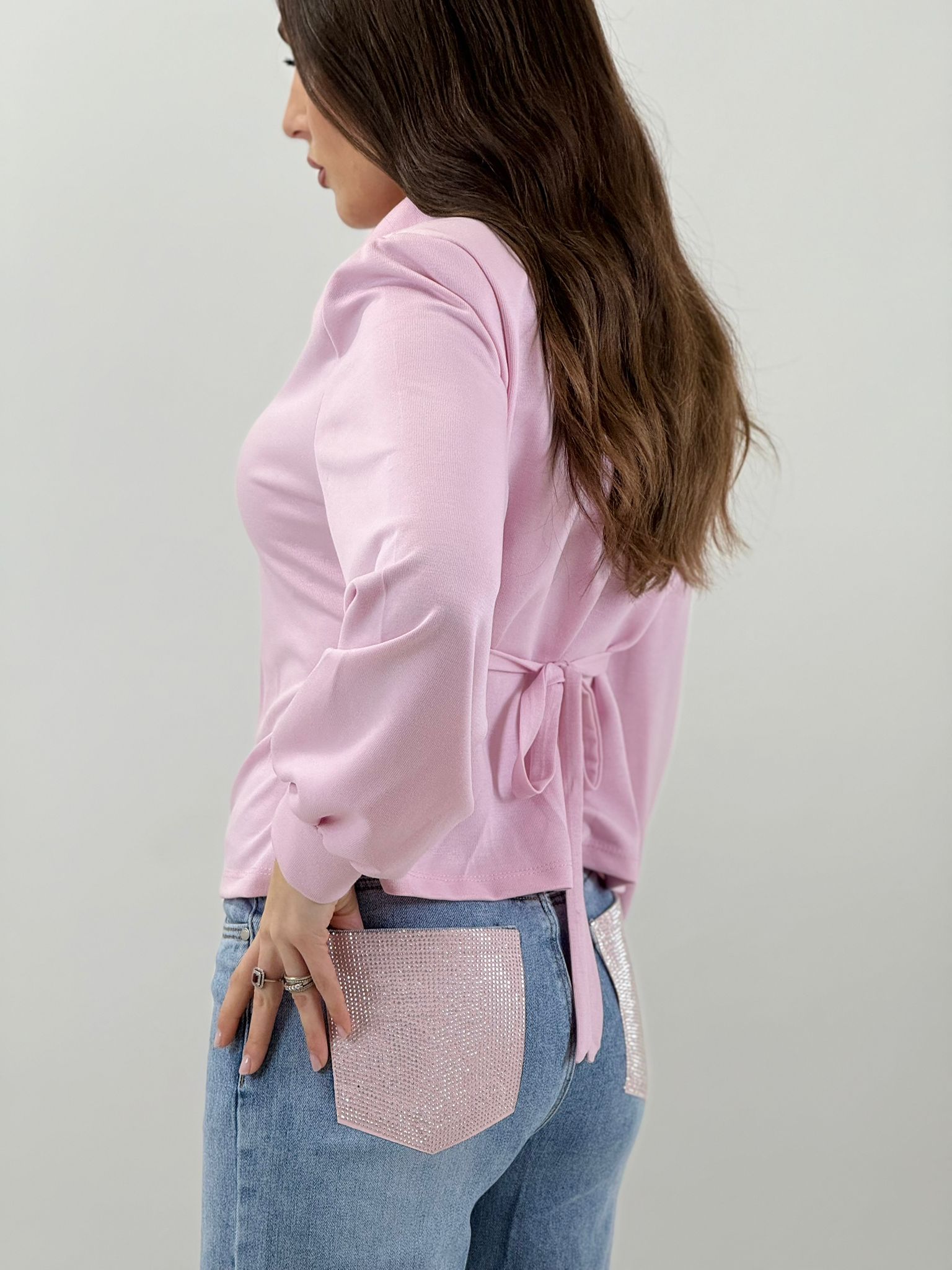Jeans con tasca brillantinata