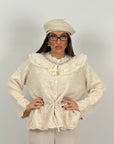 Maglia simil lana con collo in chiffon e Swarovski
