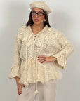 Maglia simil lana con fiori in 3D