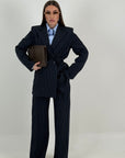 Tailleur 2000 - tailleur gessato con giacca doppio ovetto con cintura nel punto vita e pantalone palazzo