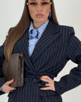 Tailleur 2000 - tailleur gessato con giacca doppio ovetto con cintura nel punto vita e pantalone palazzo
