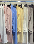 Tailleur yak - giacca lunga scollo all’americana con rouche finale e pantaloni palazzo
