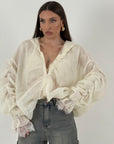 Giacca in organza con dettagli in pizzo