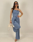 Tailleur MOUDY top a fascia effetto corpetto e pantalone palazzo
