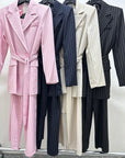 Tailleur 2000 - tailleur gessato con giacca doppio ovetto con cintura nel punto vita e pantalone palazzo